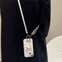 Camellia Flower and Puppy Pearl Charm Leather Crossbody Lanyard Phone Case for iPhone 16 Series